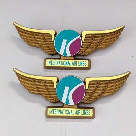 Vintage Lot (2) STOFFEL SEALS Kiwi International Wings Aviation Kids Pin - Picture 1 of 4